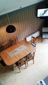 TV a/nebo společenská místnost v ubytování 14 - Fulufjellets nasjonalparker - Natur-, dyre- og fugleopplevelser