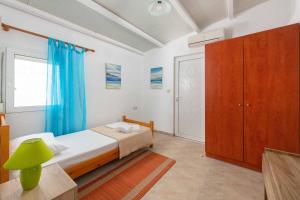 Posteľ alebo postele v izbe v ubytovaní Beach Pearl - Beach Front House with Private Pool