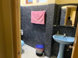 Un baño de Hello Super Hostel