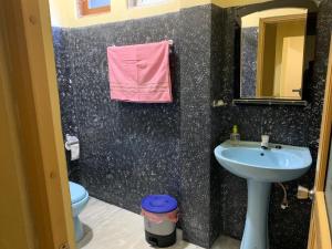 Un baño de Hello Super Hostel