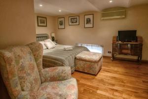 Telewizja i/lub zestaw kina domowego w obiekcie Apartment Roma Deluxe