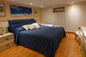 Łóżko lub łóżka w pokoju w obiekcie Apartment Roma Deluxe