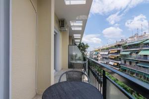 A balcony or terrace at Cozy apartment in Pangrati area!