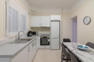 A kitchen or kitchenette at Cozy apartment in Pangrati area!