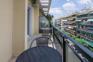 A balcony or terrace at Cozy apartment in Pangrati area!