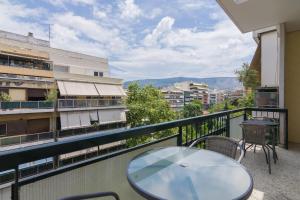 A balcony or terrace at Cozy apartment in Pangrati area!