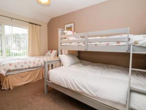 Двухъярусная кровать или двухъярусные кровати в номере The Hollies