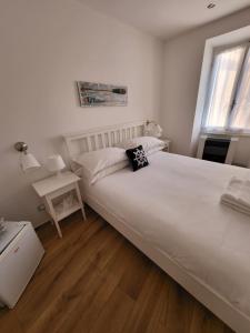 Llit o llits en una habitació de Affittacamere Il Timone