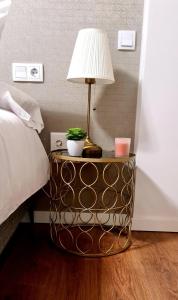A bed or beds in a room at Apartamento Viña P. Málaga Centro