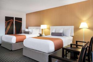 Letto o letti in una camera di Howard Johnson by Wyndham Lima