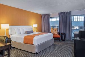 Letto o letti in una camera di Howard Johnson by Wyndham Lima