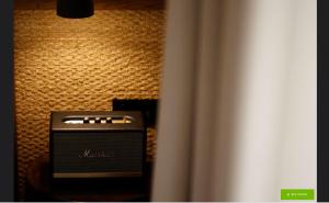 a toaster sitting on a table in a room at Amantes Villas and Suites in Nikiti