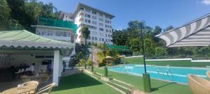 a rendering of a hotel with a swimming pool at Treenz Hotel in Gangtok