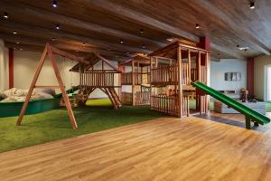 a room with several playground equipment in a room at Buona Vitta Gramado Resort & Spa by Gramado Parks in Gramado