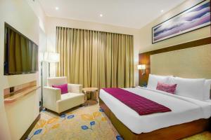 Best Western Plus Chandigarh Mohali客房内的一张或多张床位