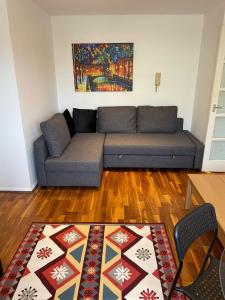 a living room with a couch and a rug at Apartment in Central London Zone 2 in London