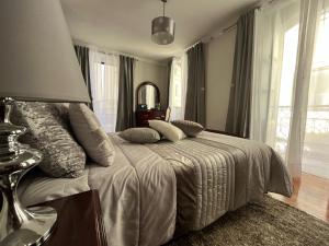 Cama ou camas em um quarto em Alojamento VINTAGE BAIXA - TOMAR