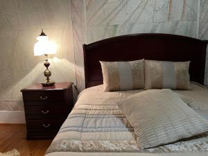 Cama ou camas em um quarto em Alojamento VINTAGE BAIXA - TOMAR