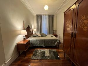Cama ou camas em um quarto em Alojamento VINTAGE BAIXA - TOMAR