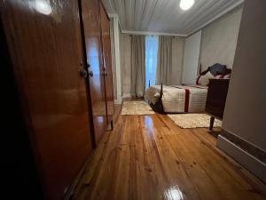 Uma área de estar em Alojamento VINTAGE BAIXA - TOMAR