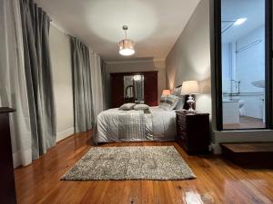 Cama ou camas em um quarto em Alojamento VINTAGE BAIXA - TOMAR
