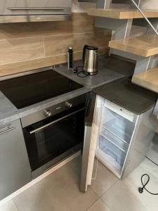 Kuchyň nebo kuchyňský kout v ubytování Loft + 1 fotografie