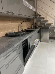 Köök või kööginurk majutusasutuses Loft