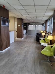 Posezení v ubytování Adresa Suites