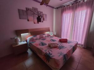 Estupendo Apartamento Gaudia房間的床
