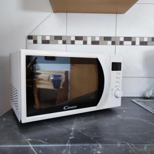 Televízia a/alebo spoločenská miestnosť v ubytovaní Ferienwohnung Seifterhof