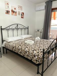 A bed or beds in a room at B&b Binario38