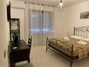 A bed or beds in a room at B&b Binario38