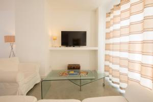 TV a/nebo společenská místnost v ubytování VBH Penthouse SPINOLA ST JULIAN