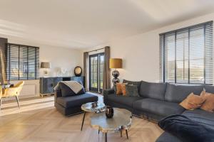 Posezení v ubytování Villa Vermeer