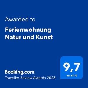 Un certificat, premiu, logo sau alt document afișat la Ferienwohnung Natur und Kunst