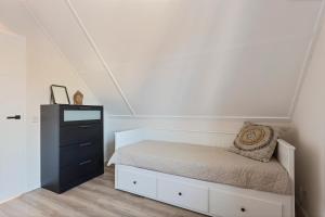 Postel nebo postele na pokoji v ubytování Villa Vermeer