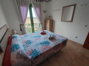 Estupendo Apartamento Gaudia房間的床