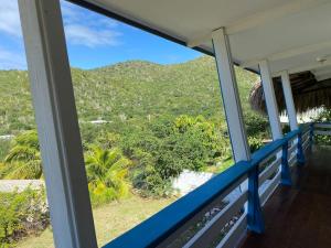 a view from the balcony of a house at Seru Papaya cabin, Westpunt in Westpunt