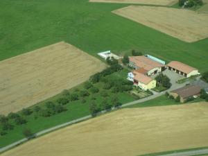 an aerial view of a house in the middle of a field at Ferienhof Arold in Creglingen