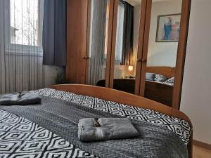 Posteľ alebo postele v izbe v ubytovaní Európa 20 Apartman