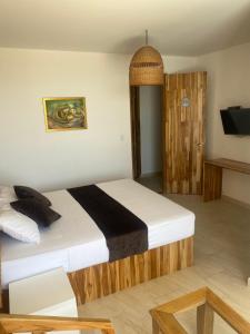 Hotel Bahia Rada客房内的一张或多张床位