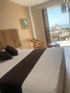 Hotel Bahia Rada客房内的一张或多张床位