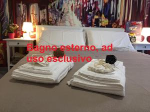 Posteľ alebo postele v izbe v ubytovaní B&B Paris