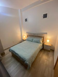 Postel nebo postele na pokoji v ubytování Estudio Loft Centro Gijón