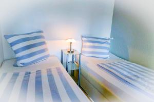 Katil atau katil-katil dalam bilik di Strandhochhaus SHB1 +11 gambar