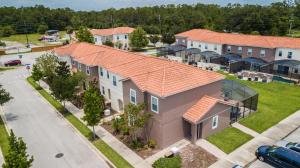 an overhead view of a house with an orange roof at Four Bedrooms Townhouse 4563 in Kissimmee