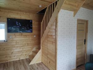 Fotografia z galérie ubytovania Domek całoroczny pod sosenką v destinácii Łapanów