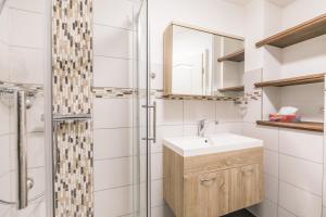 Koupelna v ubytování "Ferienhaus Nino" Ferienhaus Nino + 25 fotografií