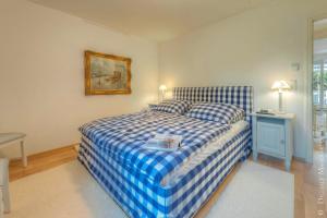 Postel nebo postele na pokoji v ubytování "Schwedenhaus" Das Schwedenhaus, Whg Agneta