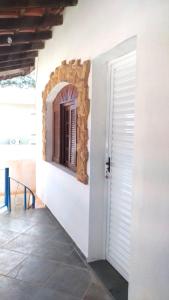 a door to a house with a window at Pousada Montanha da Pedra Grande in Atibaia +64 photos